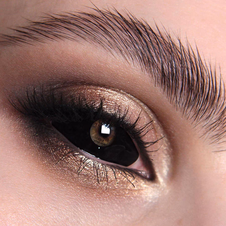 What is a black lens dilated eye?