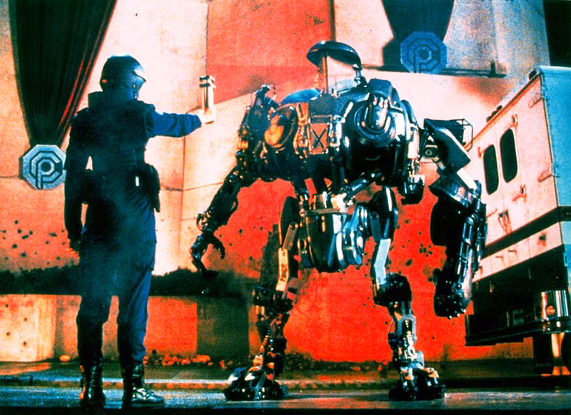 What happens at the warehouse hideout in RoboCop 2?