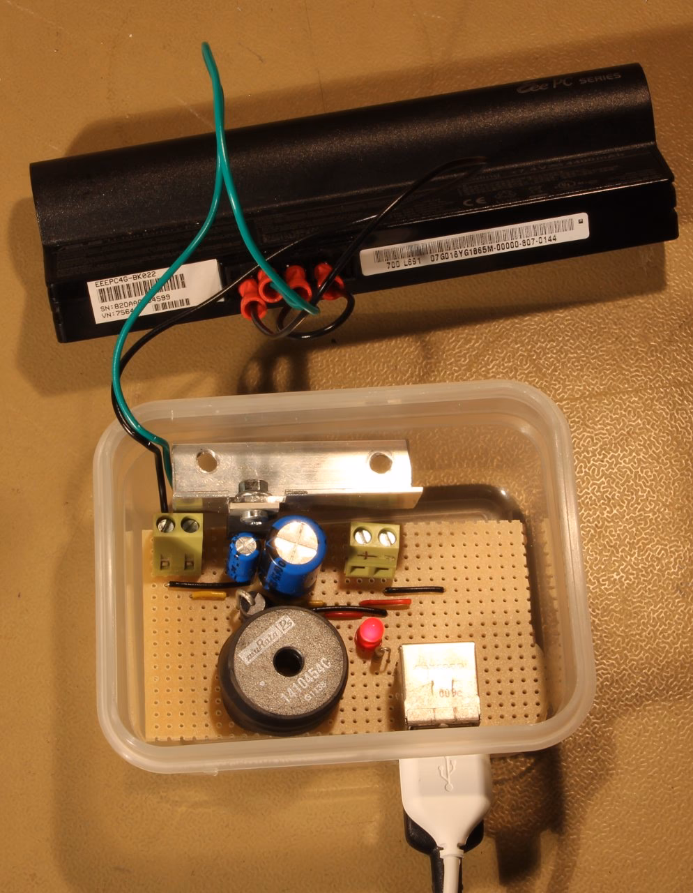 How to charge a new laptop battery for the first time?