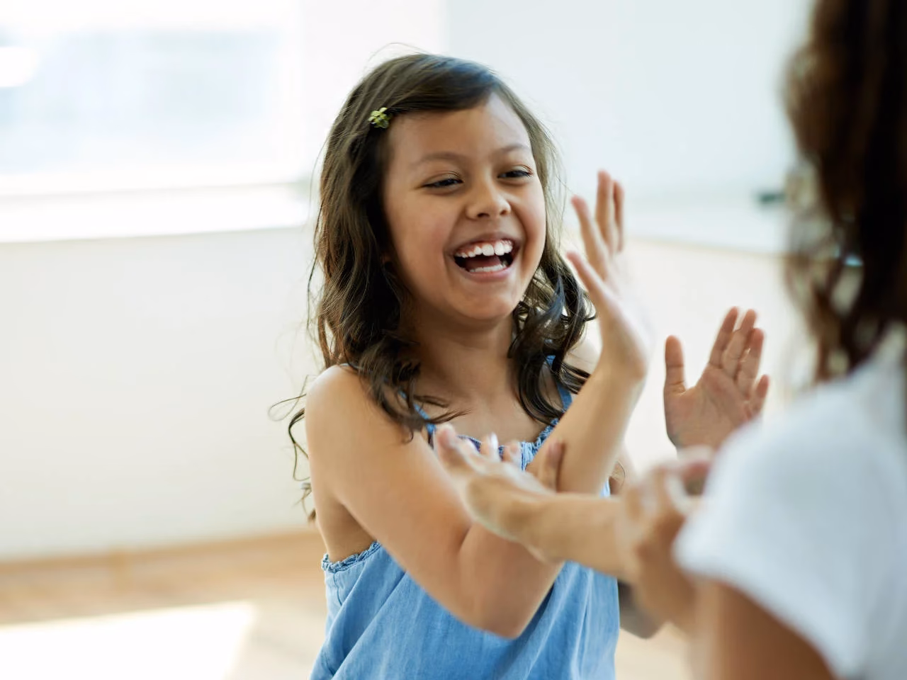 What is a hand clapping game?