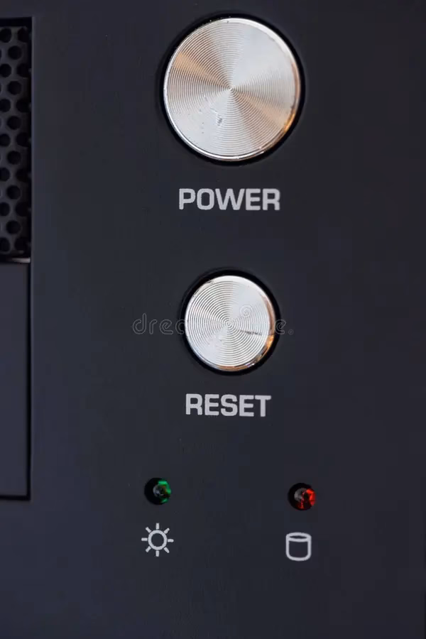 Where is the reset button on a laptop?