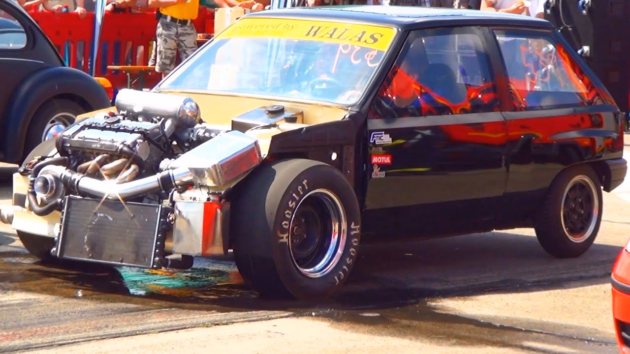 How many cars are included in Assetto drag racing car pack?