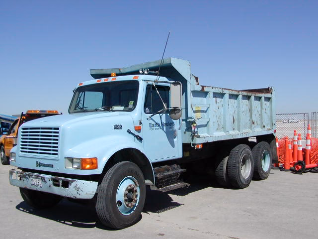 How many cubic yards can a dump truck carry?