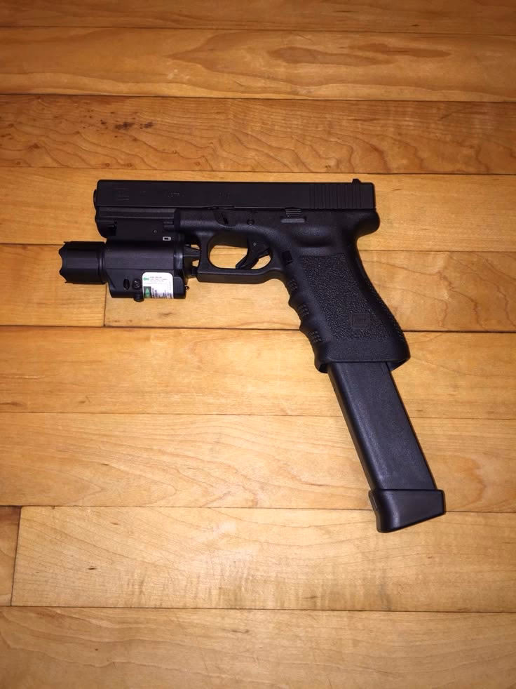 Is the Glock extended slide release compatible with a Glock pistol?