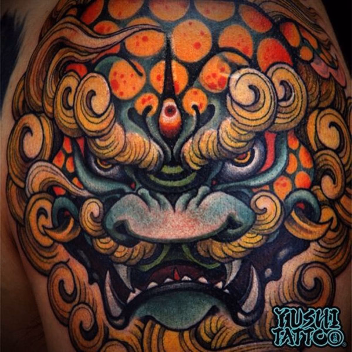 What does a guardian lion symbolize?