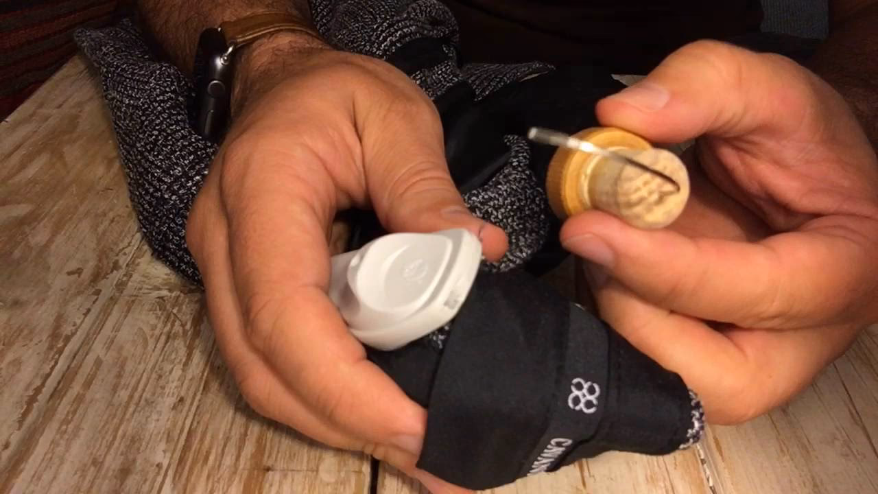 How do you remove security tags from clothing?