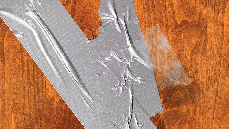 How do you remove duct tape from glass?