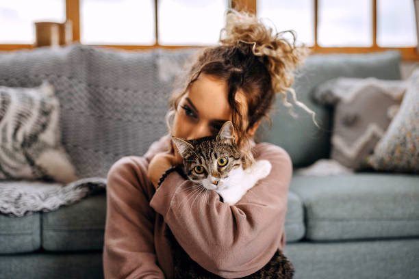 Who painted woman with a cat?