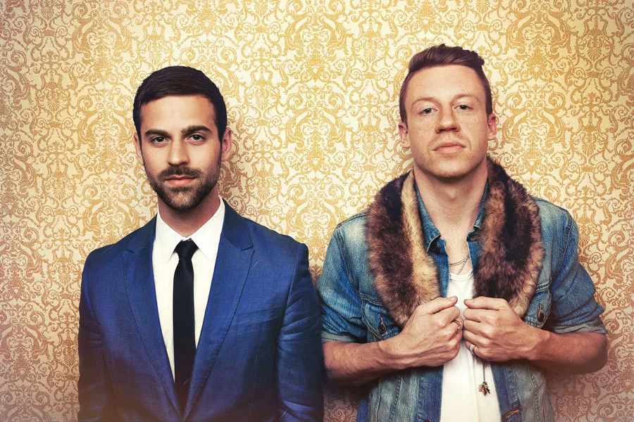 When did Macklemore & Ryan Lewis' 'Can't Hold Us' hit number one?