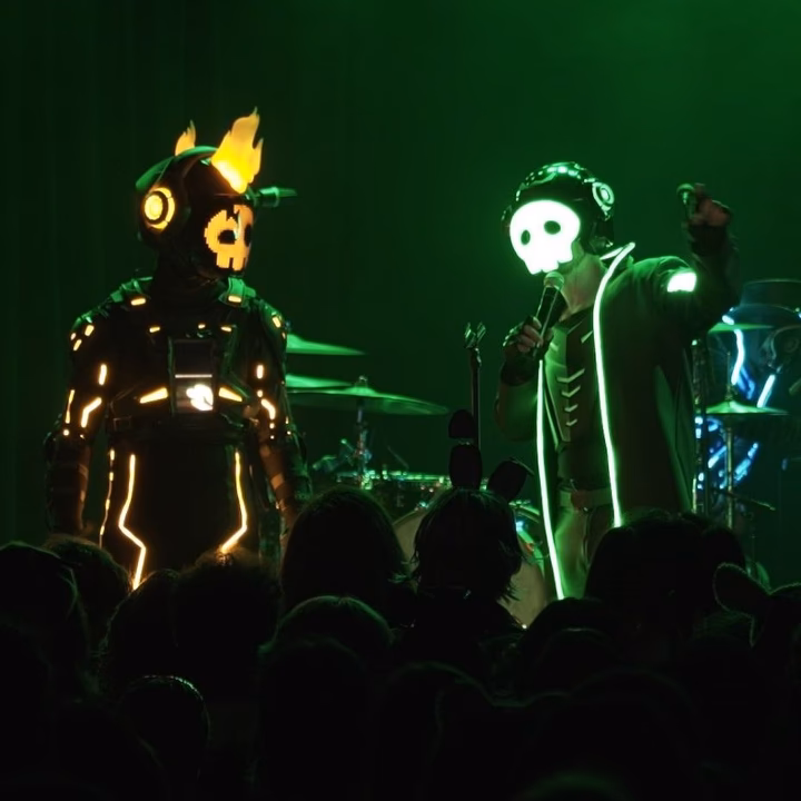 Where can I buy new music & merch from the living tombstone?