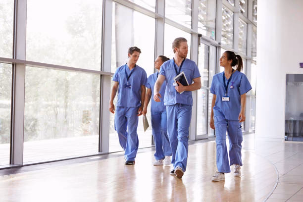 What does a nurse do in a patient room?