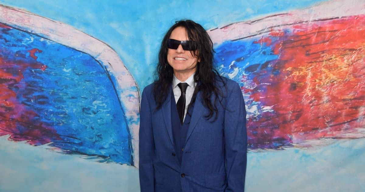 How much did Wiseau make a month?